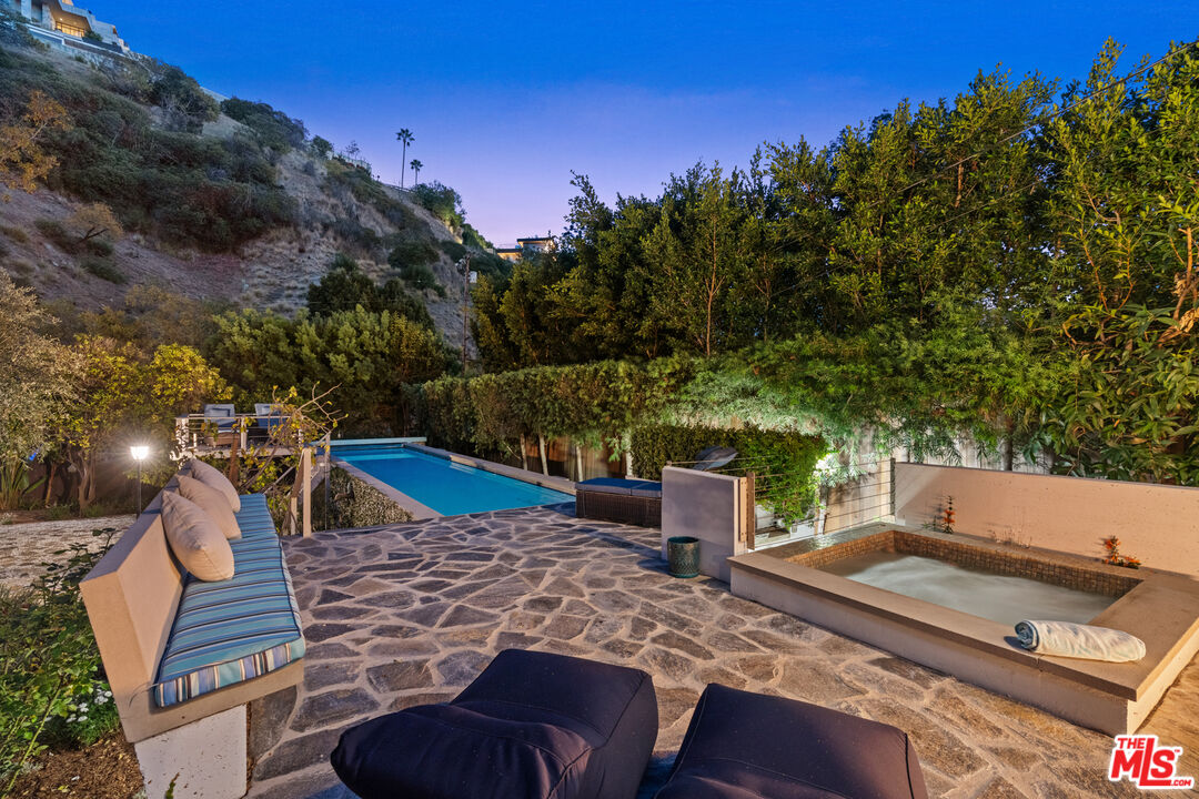 1853 Nichols Canyon Road Los Angeles, CA 90046 - Photo 46 of 48 a view of a backyard with sitting area