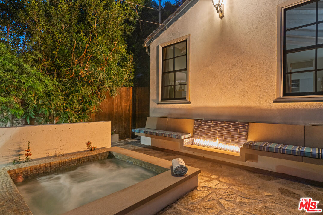 1853 Nichols Canyon Road Los Angeles, CA 90046 - Photo 47 of 48 a view of a kitchen with a sink and a couch