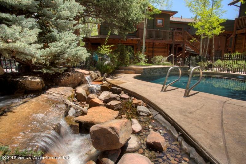507 West Main Street, Unit C101 Aspen, CO 81611 - Photo 11 of 16 a view of a backyard with sitting area