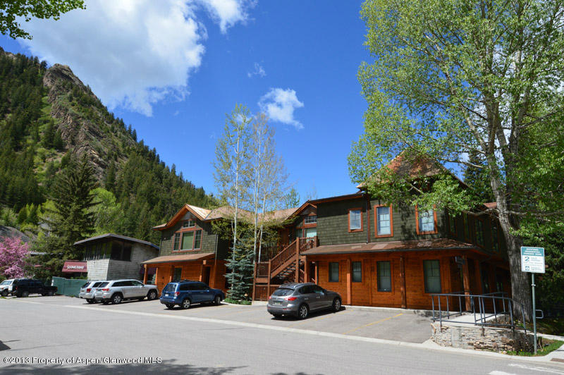 507 West Main Street, Unit C101 Aspen, CO 81611 - Photo 16 of 16 a car parked in front of a building