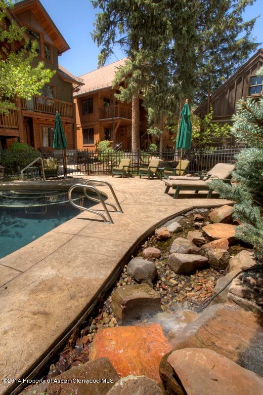 507 West Main Street, Unit C101 Aspen, CO 81611 - Photo 10 of 16 a view of swimming pool with outdoor seating