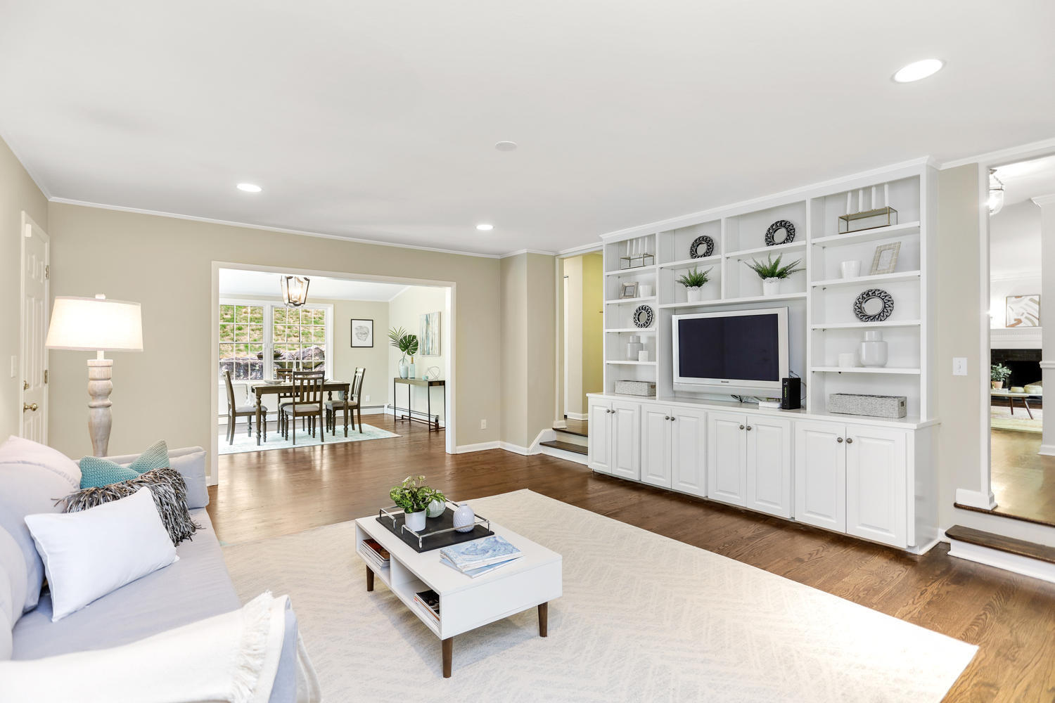 704 Valley Road New Canaan, CT 06840 - Photo 11 of 59 a living room with furniture and a flat screen tv
