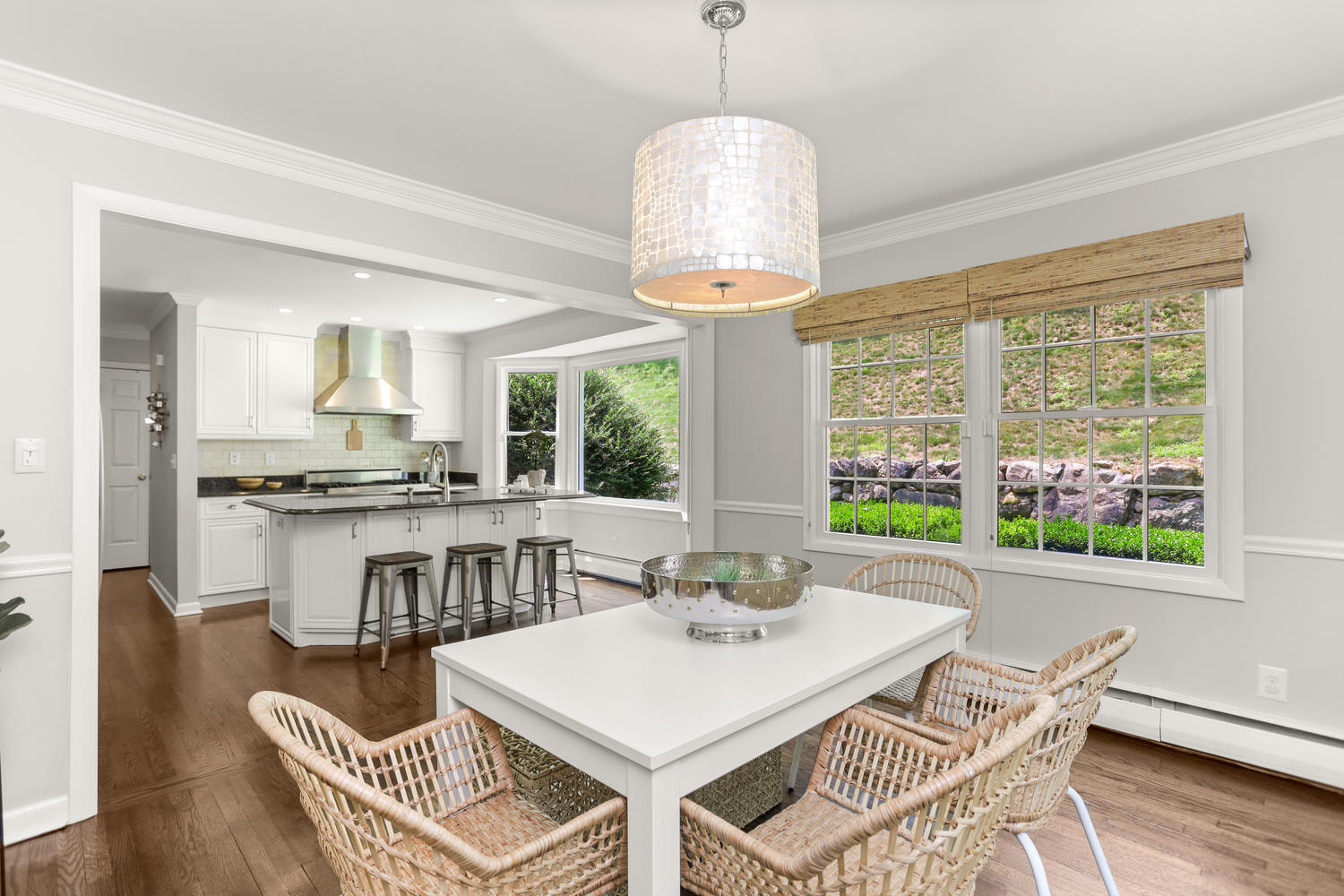 704 Valley Road New Canaan, CT 06840 - Photo 15 of 59 a view of a dining room with furniture window and wooden floor
