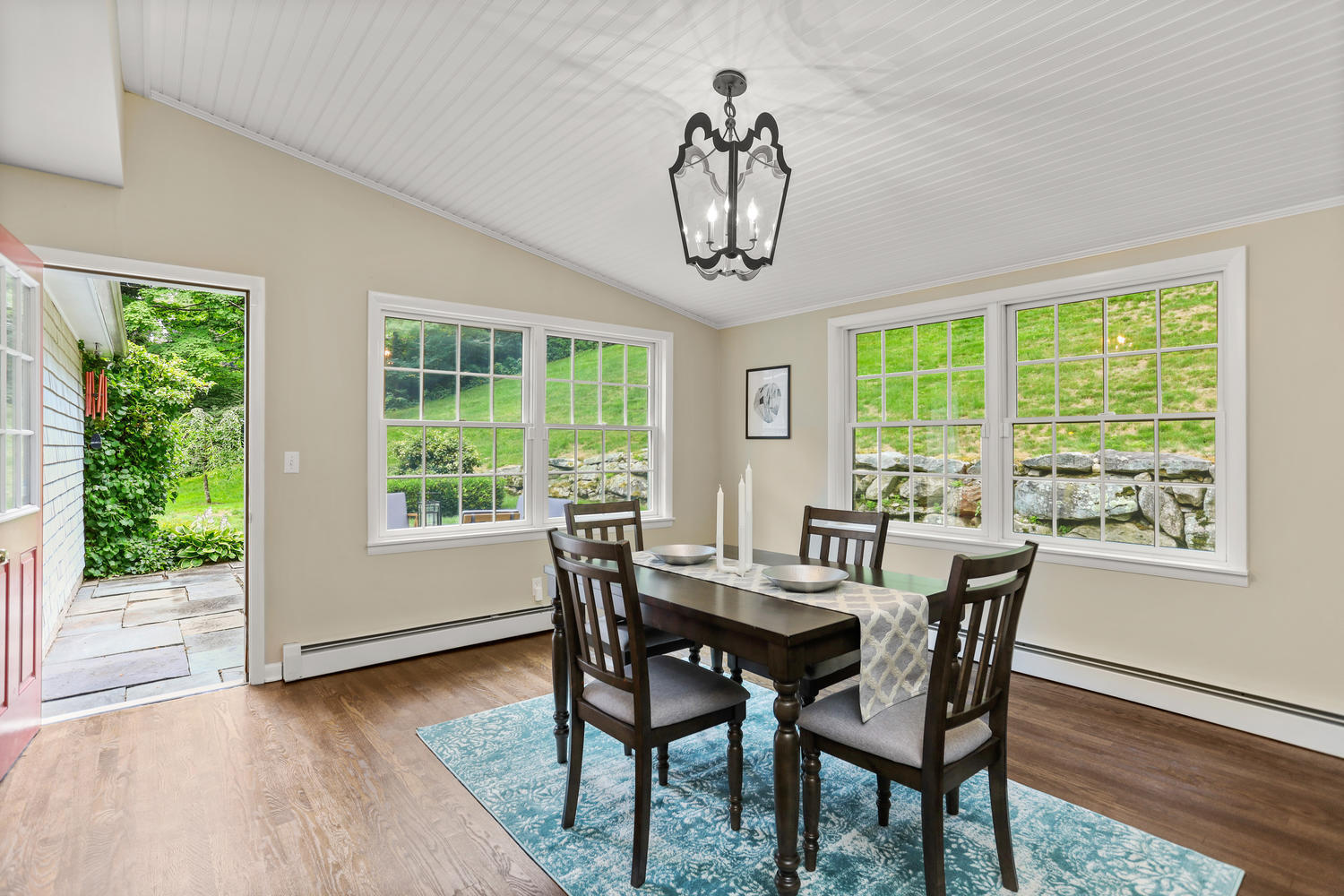 704 Valley Road New Canaan, CT 06840 - Photo 22 of 59 a view of a dining room with furniture window and wooden floor