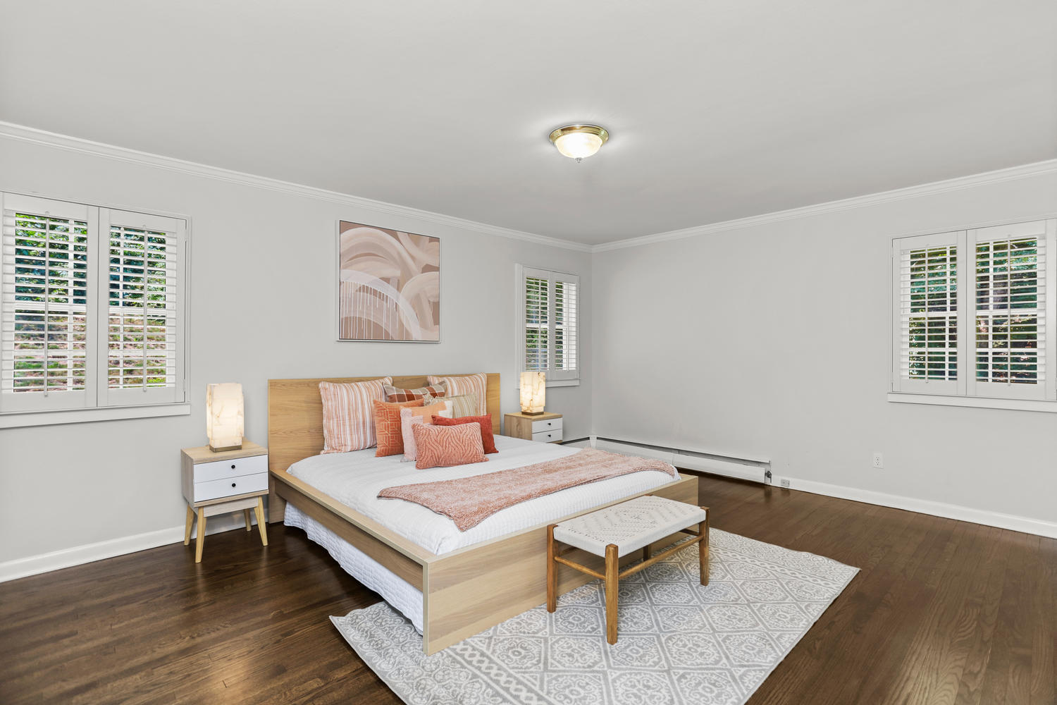 704 Valley Road New Canaan, CT 06840 - Photo 25 of 59 a bedroom with a bed and a desk
