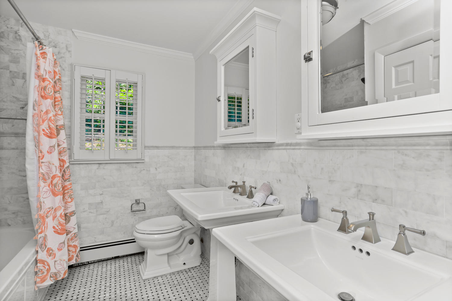 704 Valley Road New Canaan, CT 06840 - Photo 36 of 59 a bathroom with a sink and a toilet