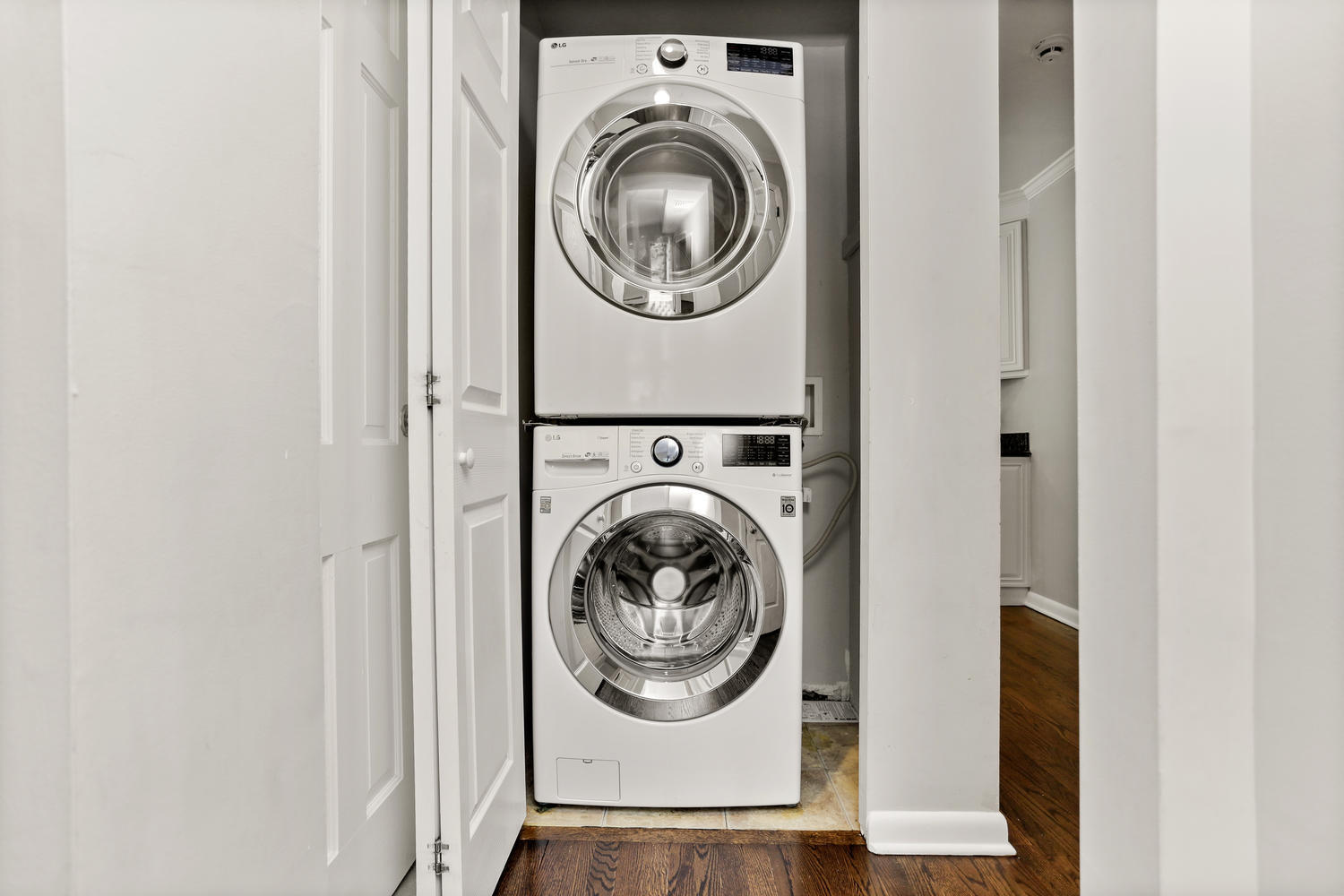 704 Valley Road New Canaan, CT 06840 - Photo 41 of 59 a utility room with dryer and washer