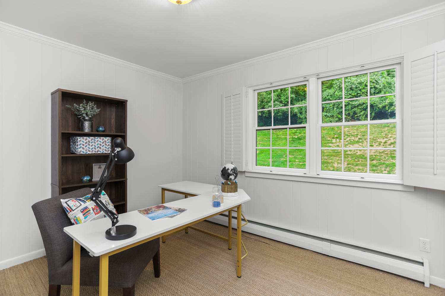 704 Valley Road New Canaan, CT 06840 - Photo 43 of 59 a work room with furniture a rug and a window