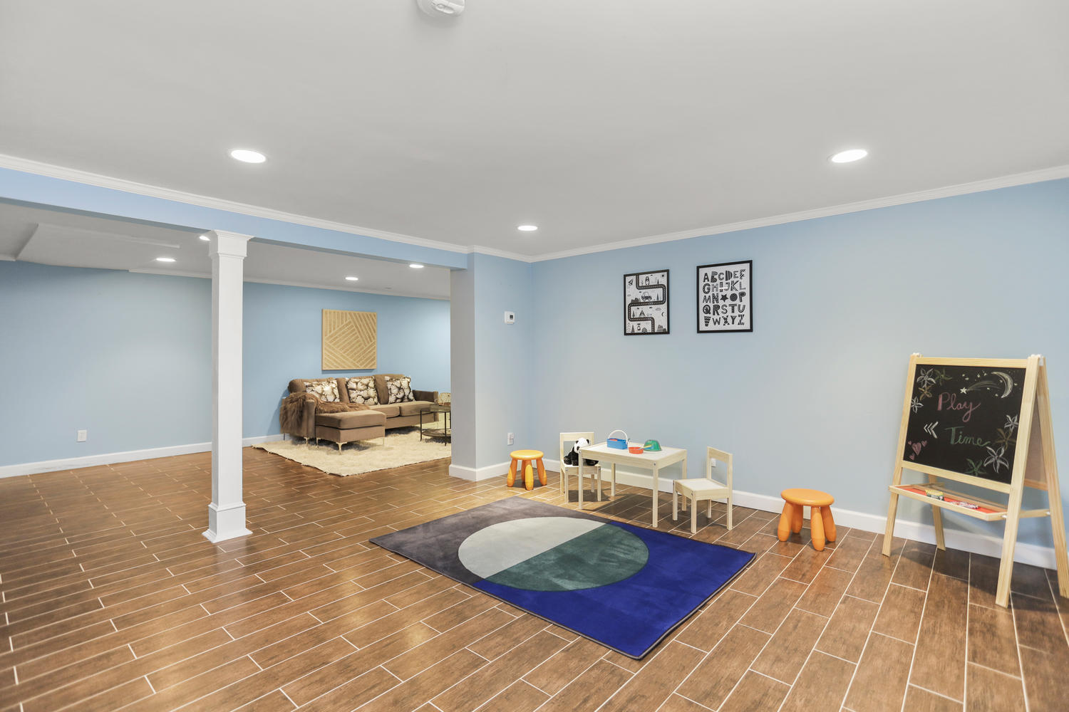704 Valley Road New Canaan, CT 06840 - Photo 46 of 59 a bedroom with furniture and a wooden floor