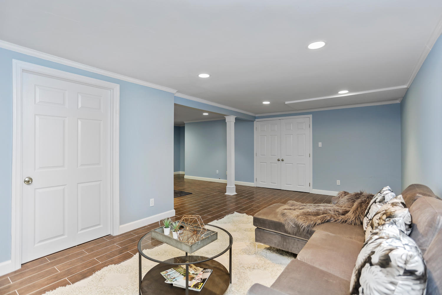 704 Valley Road New Canaan, CT 06840 - Photo 48 of 59 a bedroom with a bed and a couch