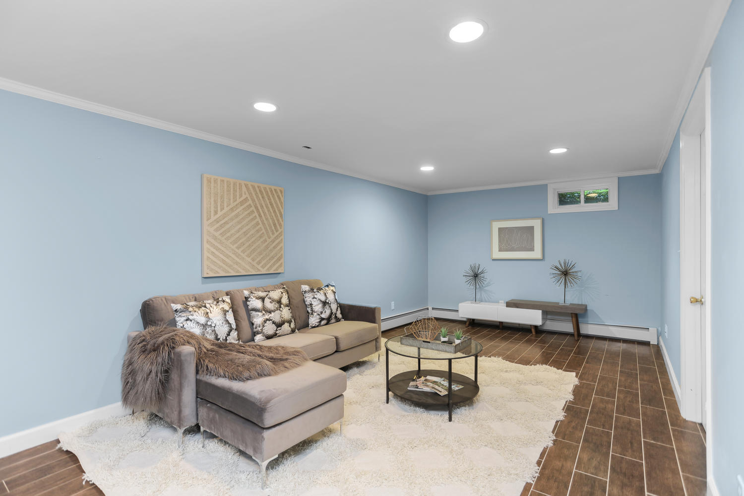 704 Valley Road New Canaan, CT 06840 - Photo 50 of 59 a living room with furniture and a rug