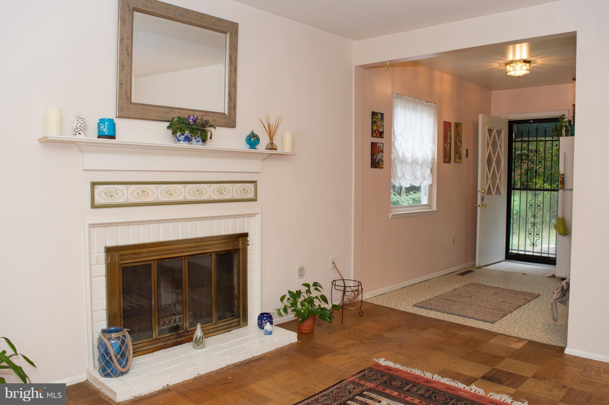 6217 Frontier Drive Springfield, VA 22150 - Photo 10 of 25 Family Room with Fireplace and Parquet floors