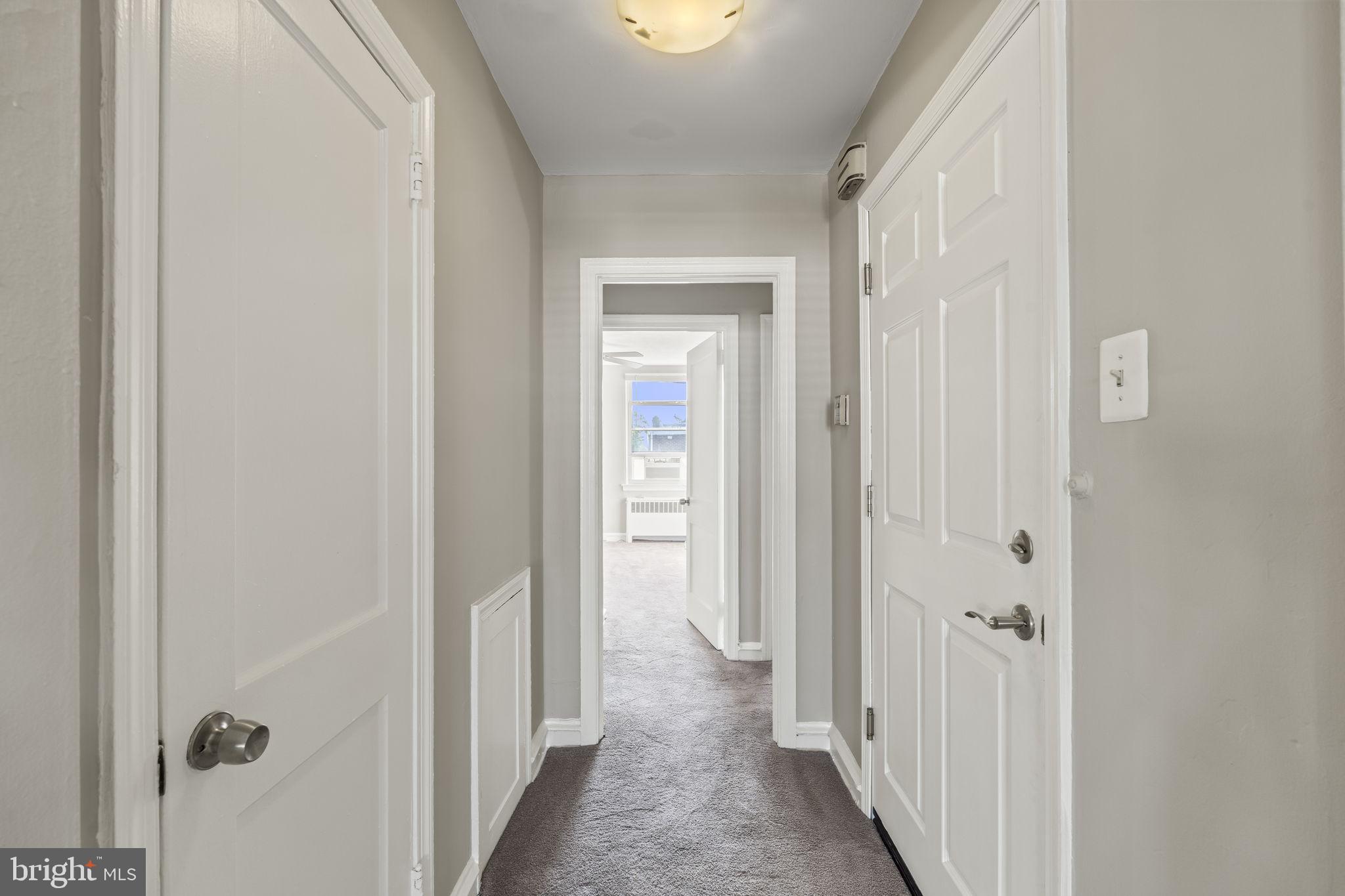 936 Vernon Road, Unit 2 Philadelphia, PA 19150 - Photo 12 of 19 a view of a bathroom from a hallway