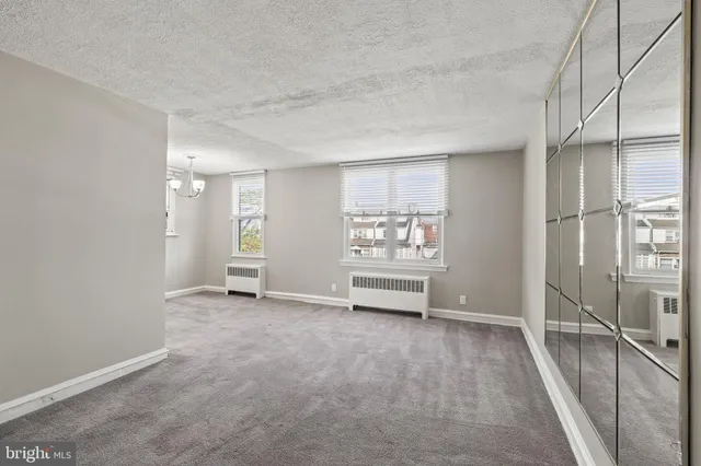 a view of room with hardwood