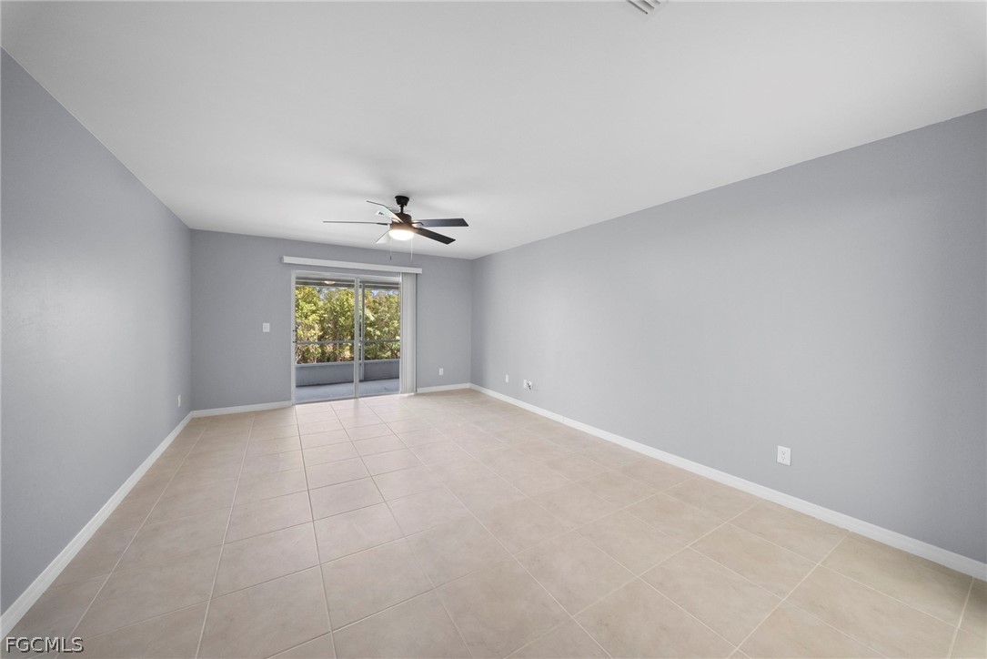 4838 29th Street Southwest Lehigh Acres, FL 33973 - Photo 14 of 25 an empty room with a empty space and windows