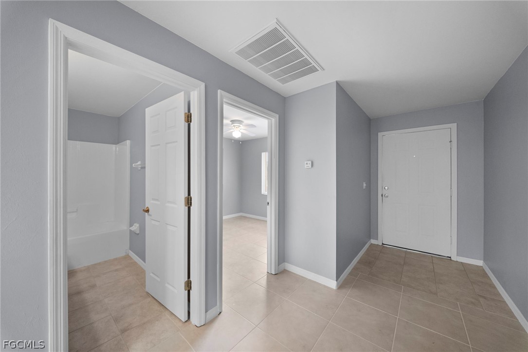 4838 29th Street Southwest Lehigh Acres, FL 33973 - Photo 4 of 25 a view of an empty room