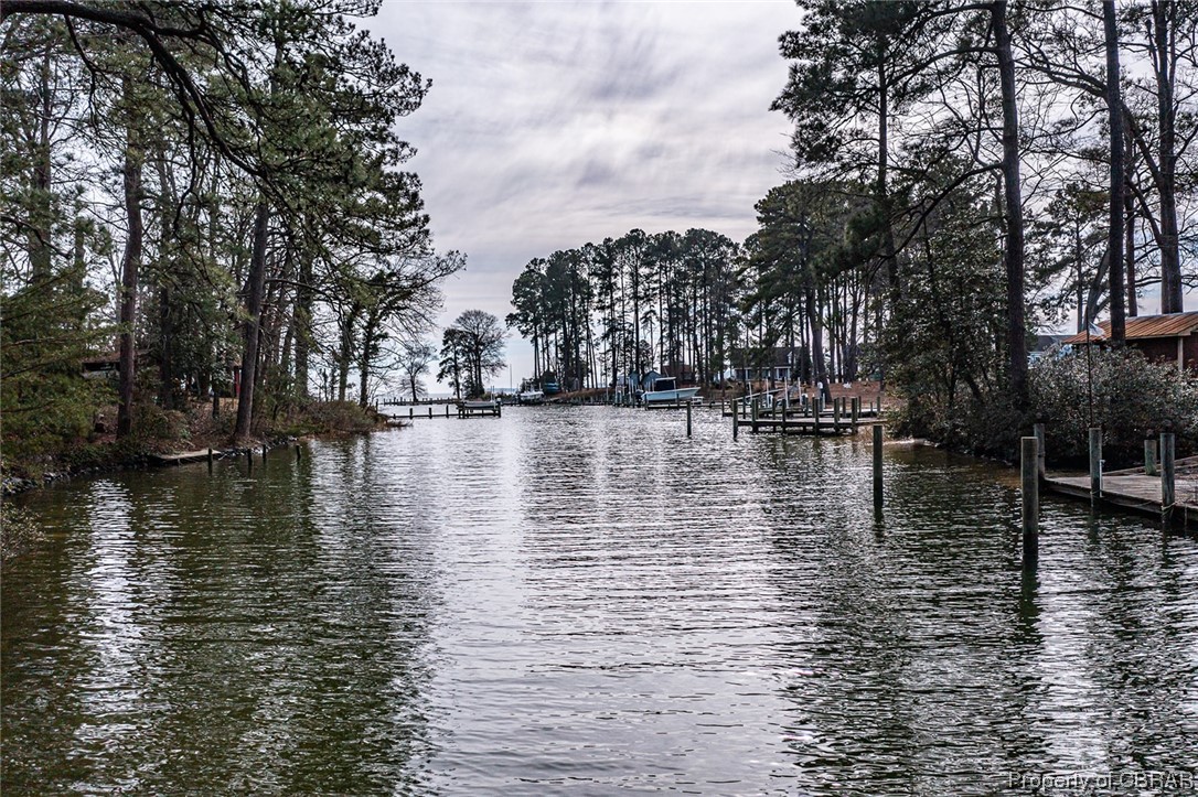 1243 Fox Point Road Reedville, VA 22539 - Photo 11 of 44 Property view of water featuring a dock
