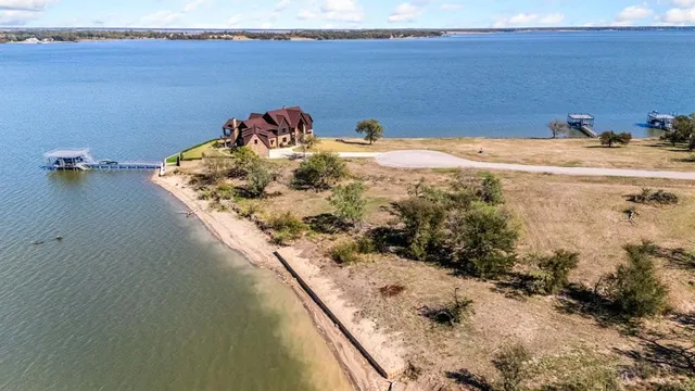 a view of a swimming pool with an outdoor space and seating area