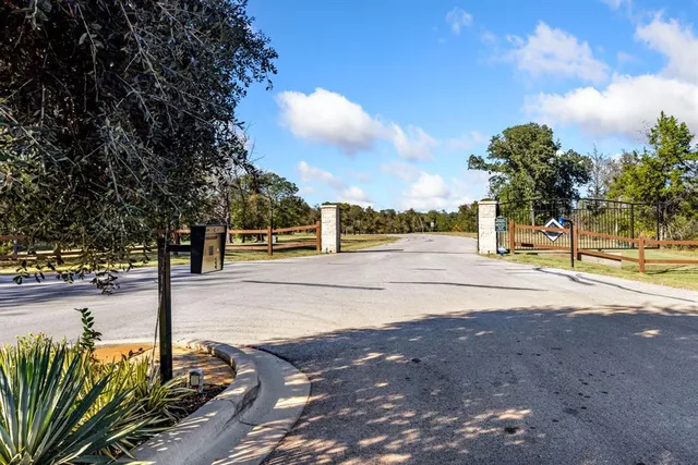 a sign board with yard