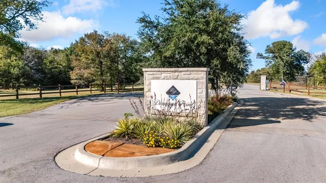 a view of a swimming pool with a yard