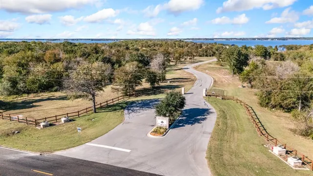 a view of a swimming pool with a table and chair