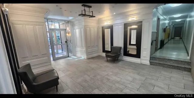 a view of a hallway with staircase