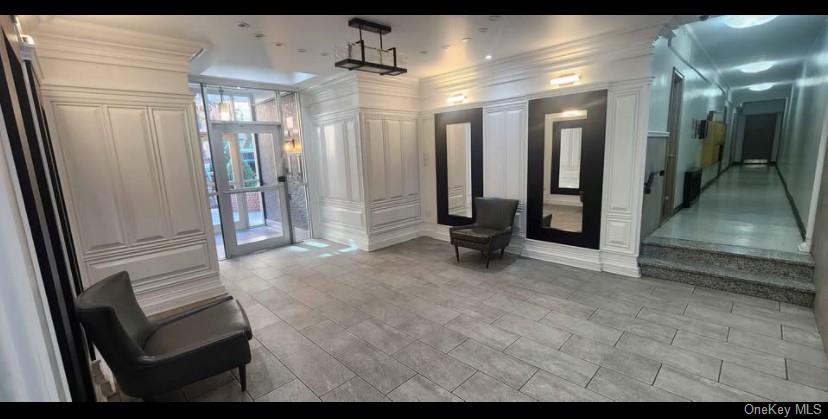 141-60 84th Road, Unit 6A Queens, NY 11435 - Photo 17 of 17 a view of a hallway with staircase