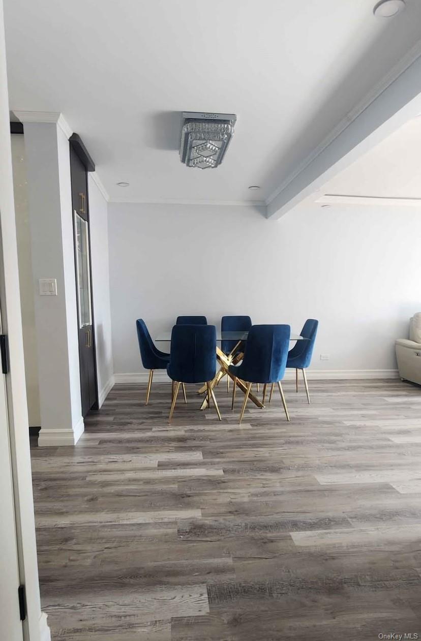 141-60 84th Road, Unit 6A Queens, NY 11435 - Photo 4 of 17 a view of dining room and with furniture