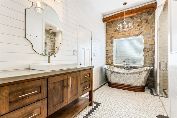 a kitchen with stainless steel appliances granite countertop a stove and a sink