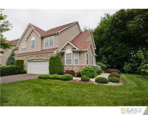 12 Stewart Court Old Bridge, NJ 08857 - Photo 2 of 14 a view of a house with a big yard and potted plants