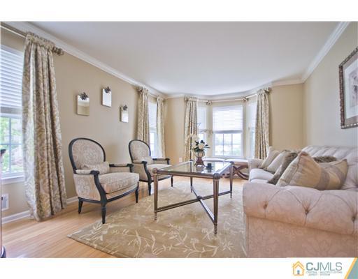 12 Stewart Court Old Bridge, NJ 08857 - Photo 5 of 14 a living room with furniture and wooden floor