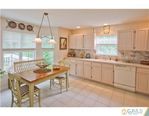 12 Stewart Court Old Bridge, NJ 08857 - Photo 10 of 14 a kitchen with a sink cabinets and window