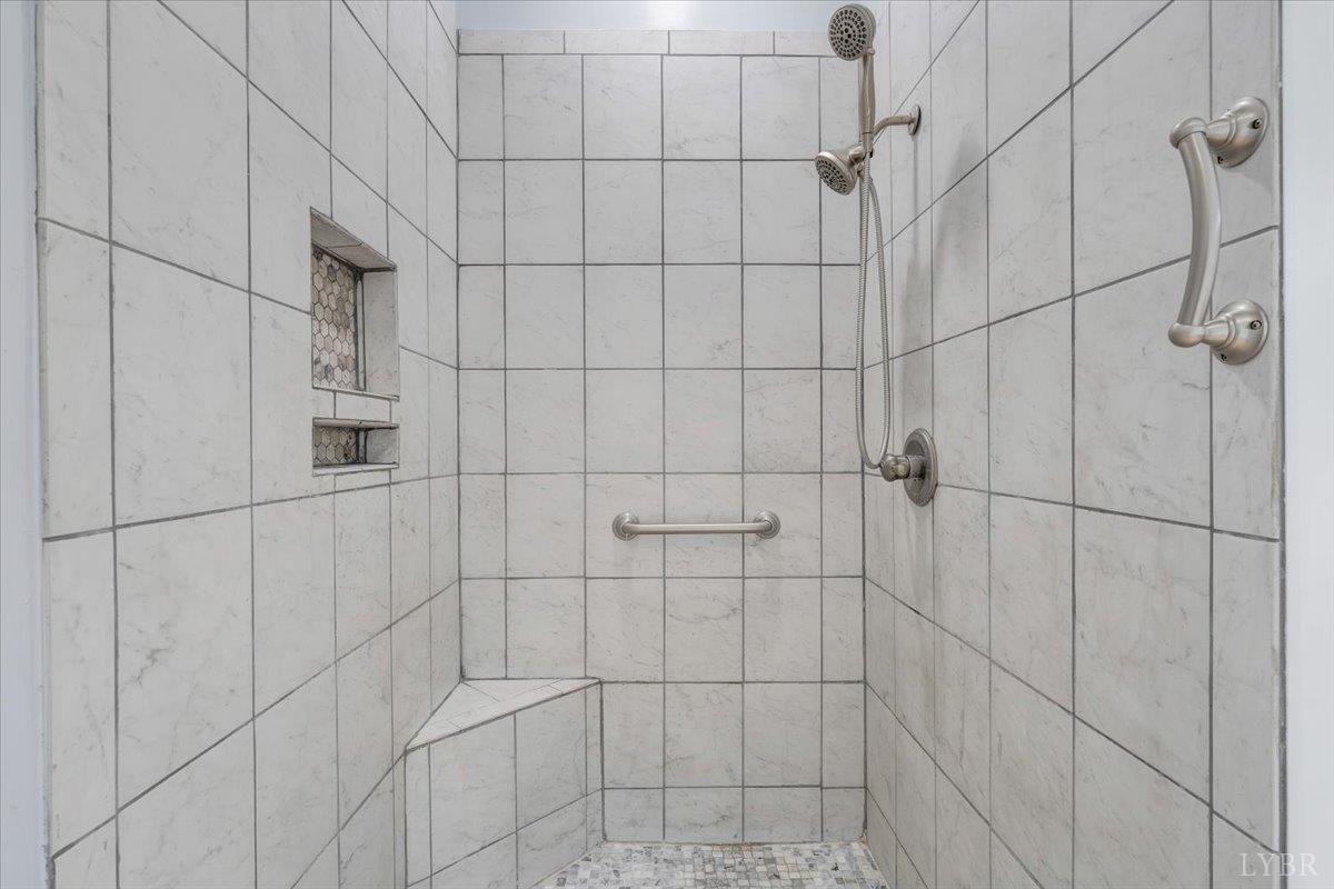 1250 Our Cove Road Huddleston, VA 24104 - Photo 25 of 70 a bathroom with a shower