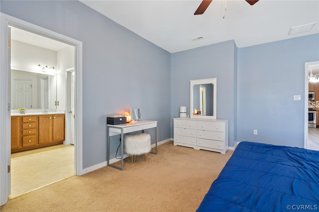 4207 Eagle Drive Hopewell, VA 23860 - Photo 12 of 28 a bedroom with a bed and a view of kitchen