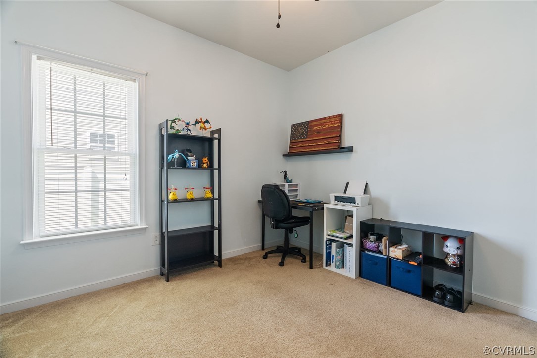 4207 Eagle Drive Hopewell, VA 23860 - Photo 19 of 28 a view of a workspace with furniture and a window