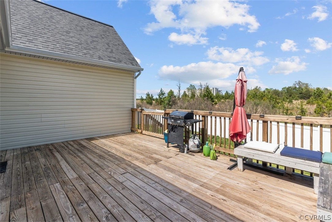 4207 Eagle Drive Hopewell, VA 23860 - Photo 24 of 28 a view of a roof deck with wooden floor and fence
