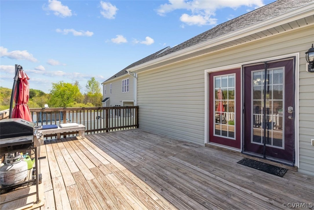 4207 Eagle Drive Hopewell, VA 23860 - Photo 25 of 28 a view of deck with a flat screen tv and wooden floor
