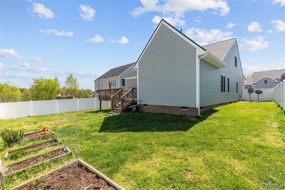 4207 Eagle Drive Hopewell, VA 23860 - Photo 27 of 28 a view of a house with backyard and garden
