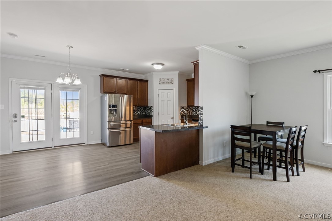 4207 Eagle Drive Hopewell, VA 23860 - Photo 6 of 28 a kitchen with a table and chairs in it