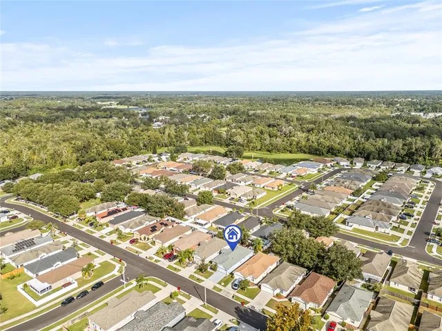 an aerial view of residential building with parking space