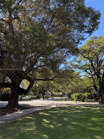 a view of a golf course with a lake