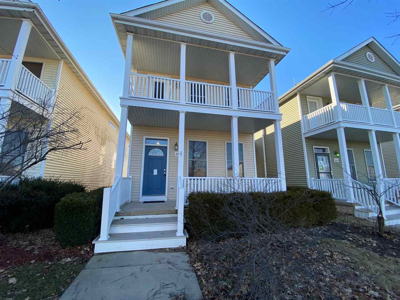 225 Market Street Genoa, IL 60135 - Photo 1 of 13 a front view of a house with a yard