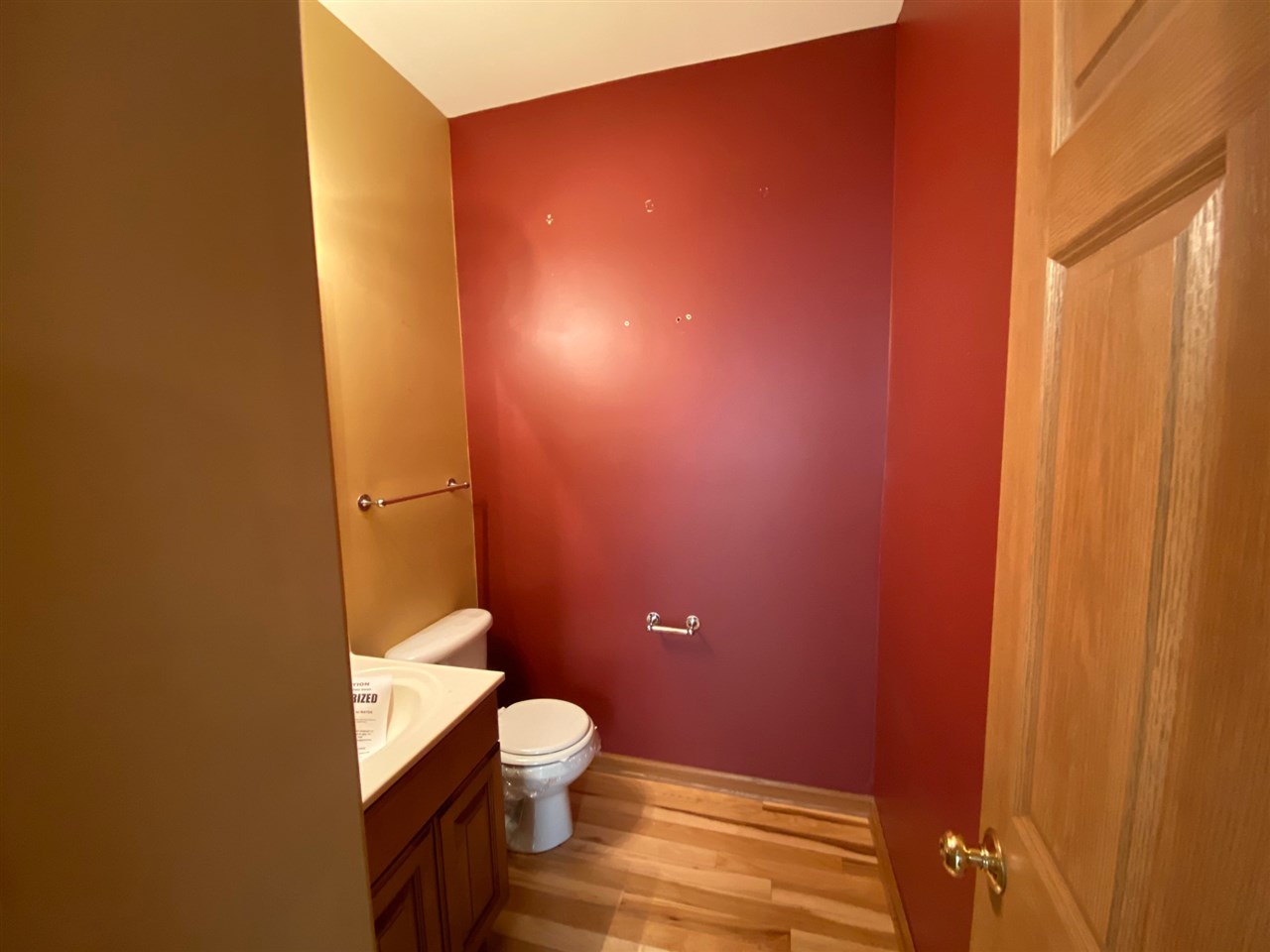 225 Market Street Genoa, IL 60135 - Photo 6 of 13 a bathroom with a toilet and a sink