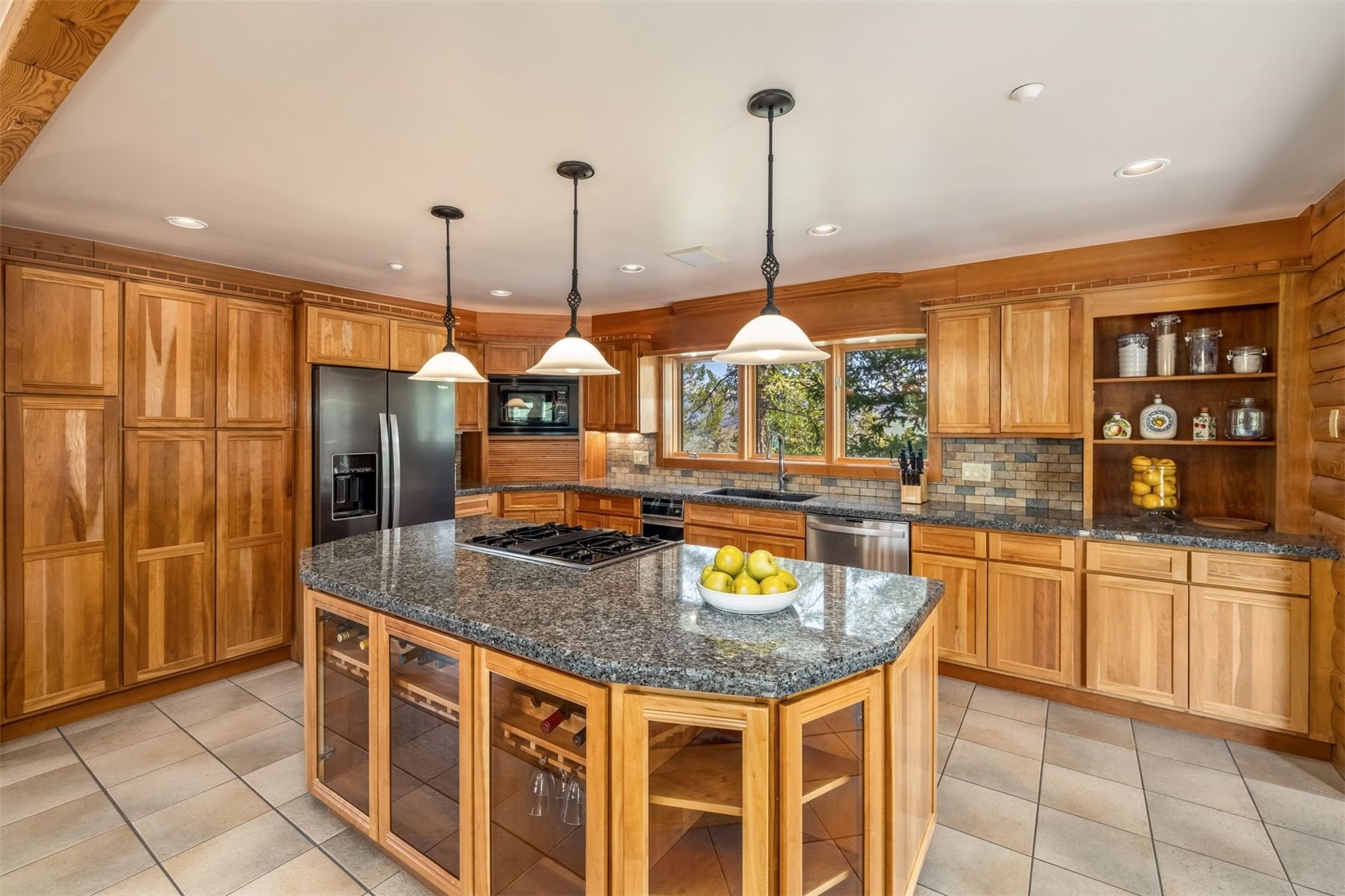 2244 Johnson Road Silverthorne, CO 80498 - Photo 14 of 50 a kitchen with stainless steel appliances granite countertop a stove and a sink with granite countertops
