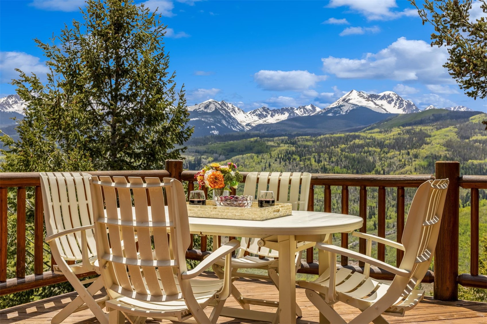 2244 Johnson Road Silverthorne, CO 80498 - Photo 2 of 50 a view of a chairs and table on the terrace