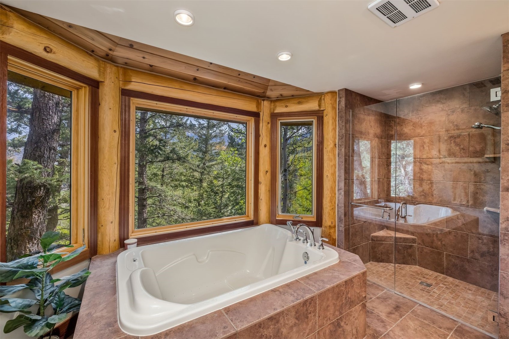 2244 Johnson Road Silverthorne, CO 80498 - Photo 22 of 50 a spacious bathroom with a tub and shower