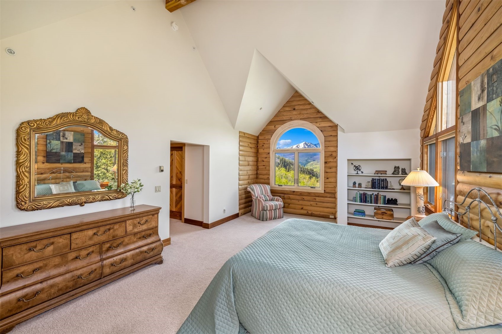 2244 Johnson Road Silverthorne, CO 80498 - Photo 26 of 50 a bedroom with a bed and a large dresser