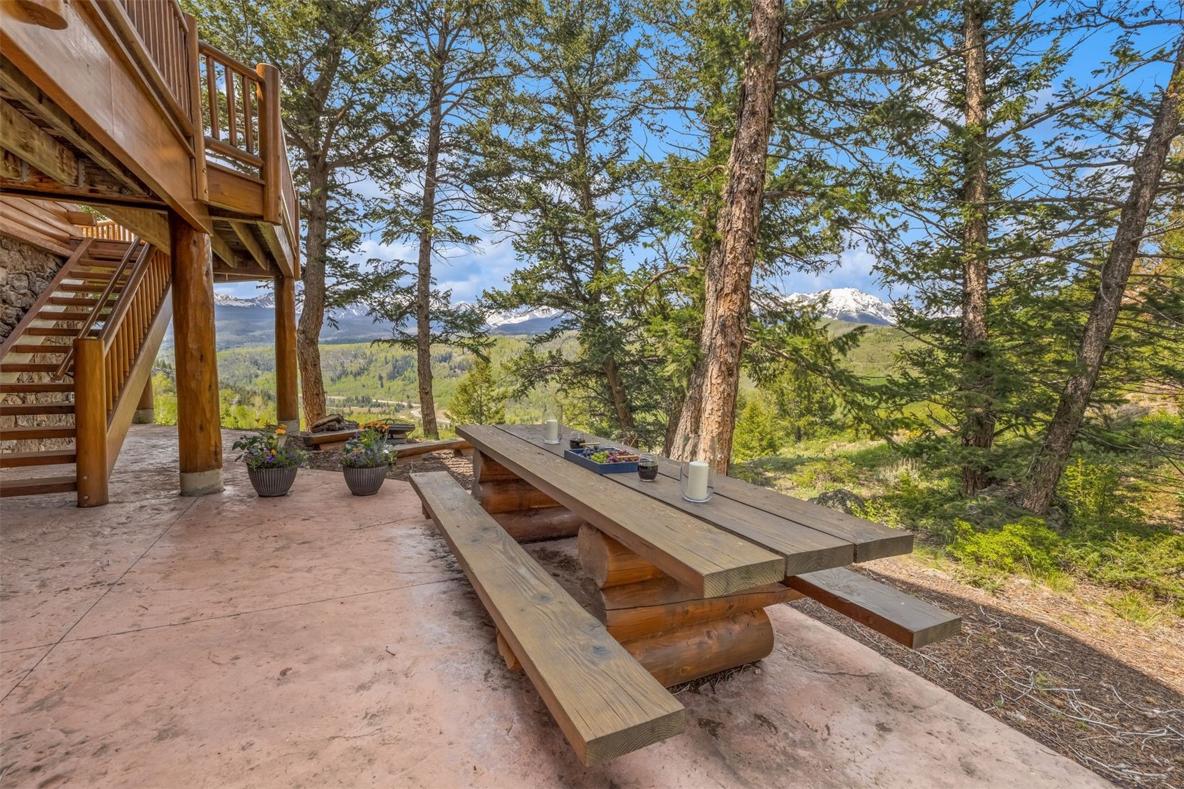 2244 Johnson Road Silverthorne, CO 80498 - Photo 40 of 50 a view of a chairs and table in the patio