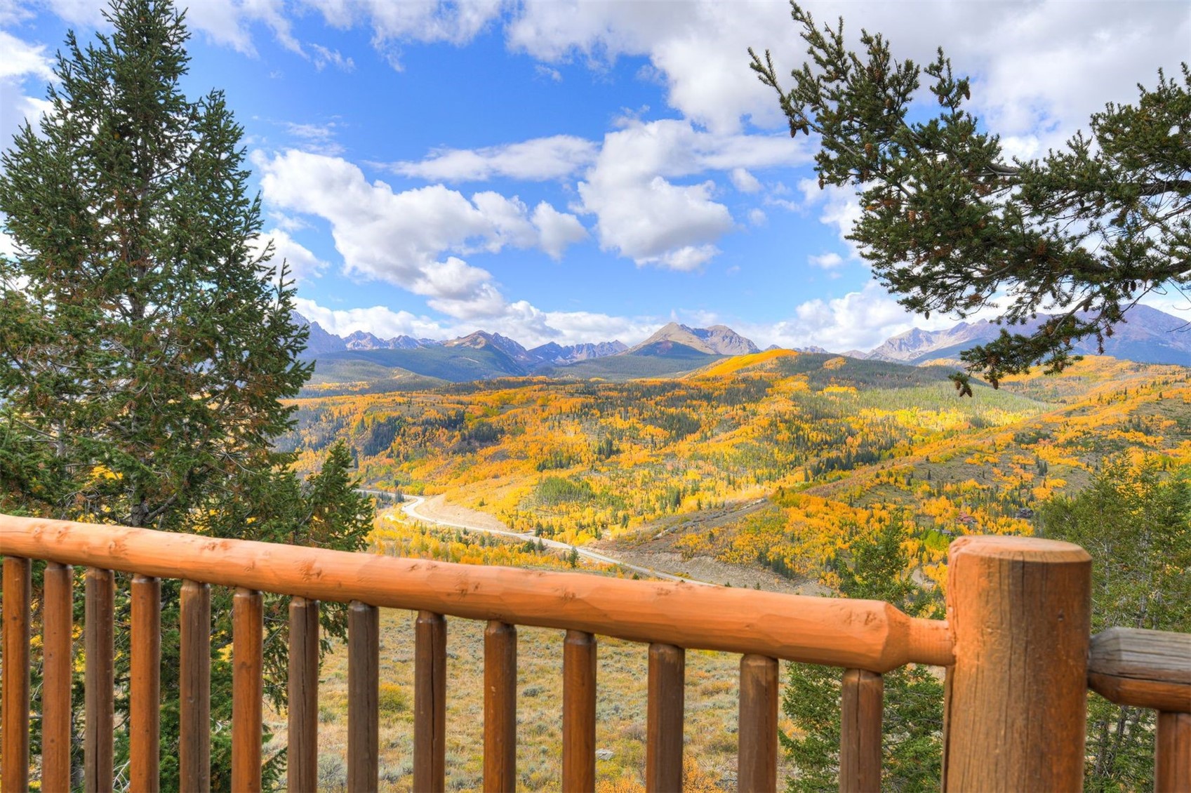 2244 Johnson Road Silverthorne, CO 80498 - Photo 45 of 50 a view of a balcony with wooden floor and fence