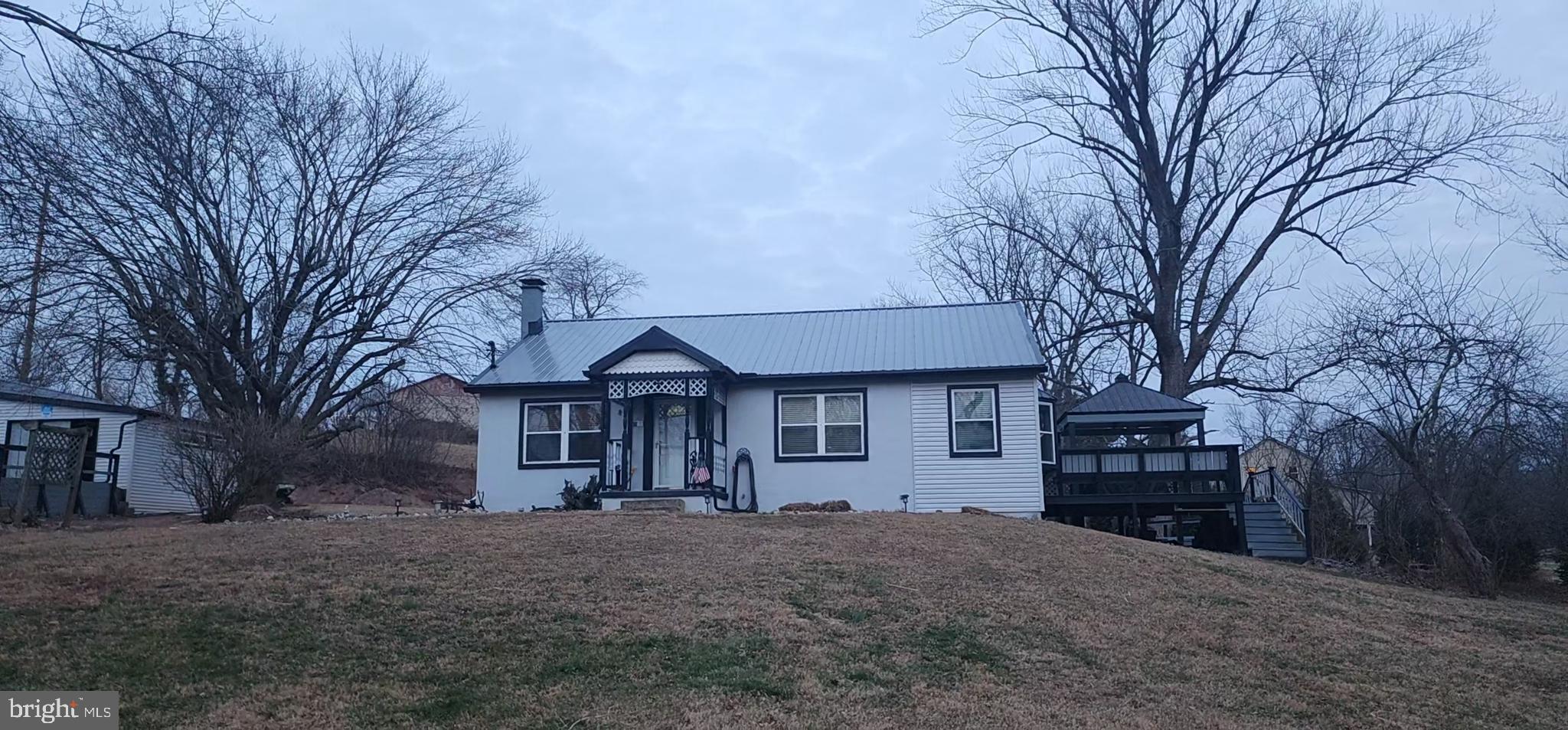 3370 Valley Road Marysville, PA 17053 - Photo 2 of 7 a front view of a house with a yard and garage